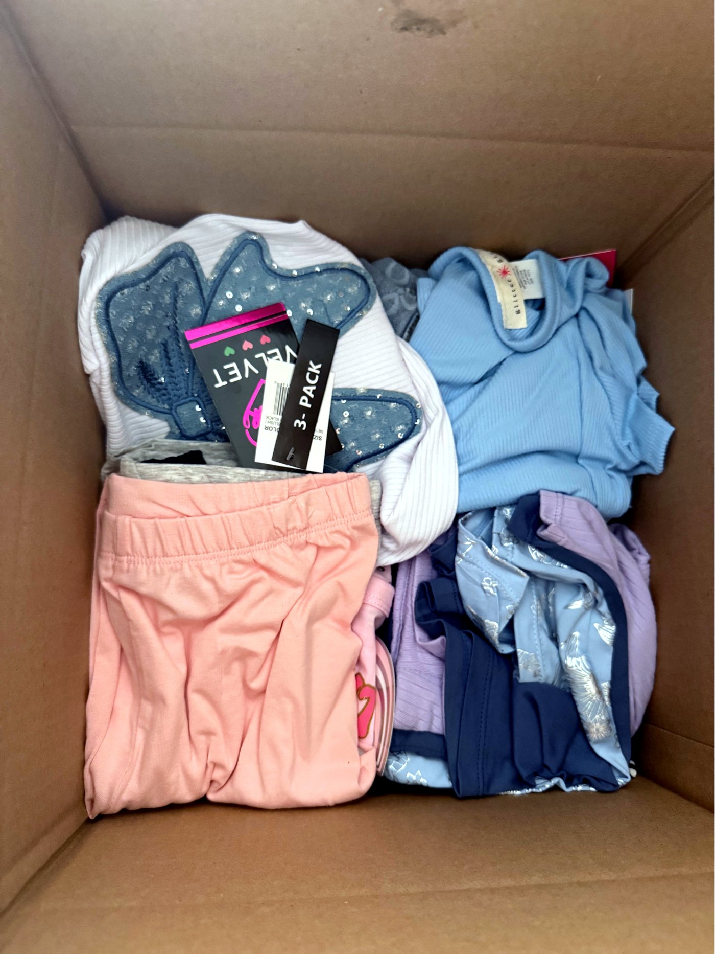 Children's clothing packed for delivery